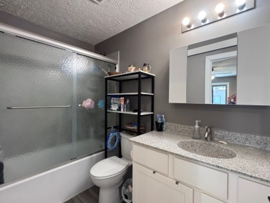 Welcome to easy lake living with this unique off-water - photo 12