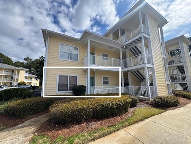 This fully furnished ground floor condo has tile floor and - photo 21