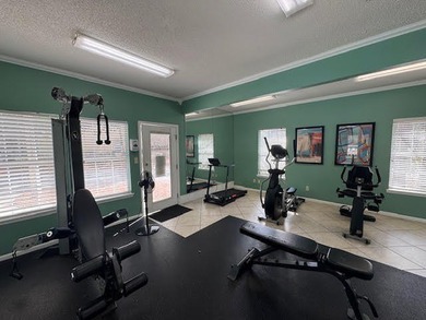 This fully furnished ground floor condo has tile floor and - photo 23