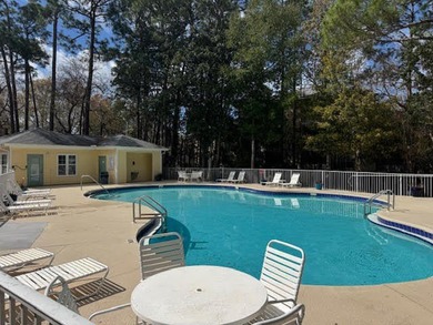 This fully furnished ground floor condo has tile floor and - photo 26