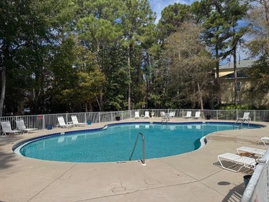 This fully furnished ground floor condo has tile floor and - photo 27