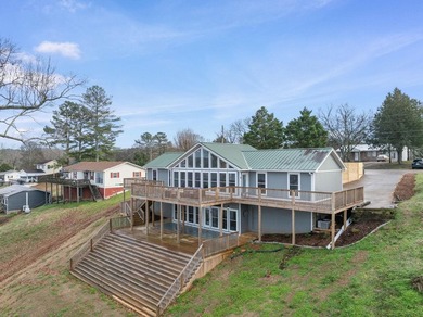 Wake up to open views of the Tennessee River in a home where the - photo 29