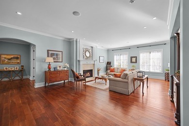 This elegant executive brick home offers luxury living and