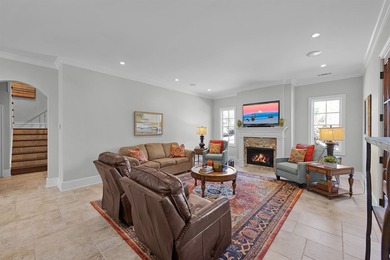 This elegant executive brick home offers luxury living and