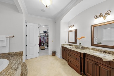 This elegant executive brick home offers luxury living and - photo 22