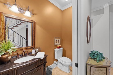 This elegant executive brick home offers luxury living and - photo 23