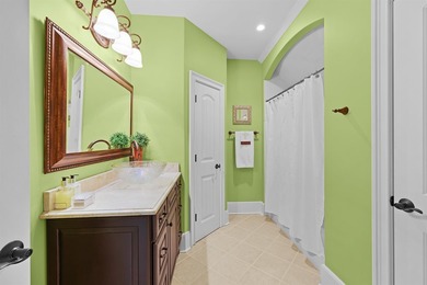 This elegant executive brick home offers luxury living and - photo 32