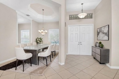 SITUATED ON A PREMIUM CORNER LOT THIS RESIDENCE OFFERS A BRIGHT - photo 4