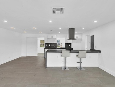 Experience the ultimate in modern waterfront living at 5710 SW - photo 11