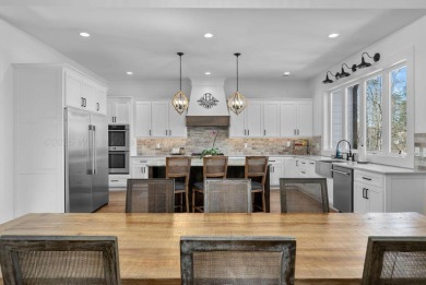 Experience a new standard in this recently constructed - photo 11