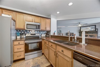 This stunning 2-level condo at Regatta Bay is everything a lake - photo 18
