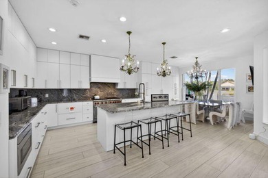 Welcome to this light-filled, newly renovated 4 Bedroom, 3 Bath