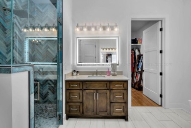 Experience a new standard in this recently constructed - photo 21