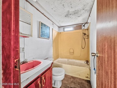 Set on a beautiful 50' x 150' wooded lot tucked deep within the - photo 22