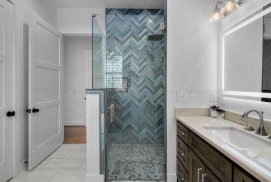 Experience a new standard in this recently constructed - photo 22