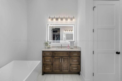 Experience a new standard in this recently constructed - photo 23
