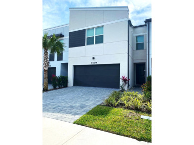 (private lake, pond, creek) Townhome/Townhouse For Sale in Mangonia Park Florida
