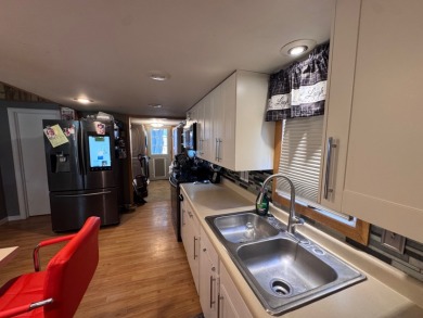 Welcome to easy lake living with this unique off-water - photo 22