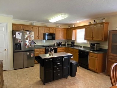 Welcome to Cross Creek Subdivision. A gated community on the - photo 5
