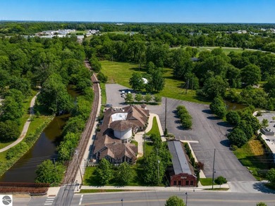 10,000sq. ft + acres in downtown Mt. Pleasant. 600' of River - photo 37