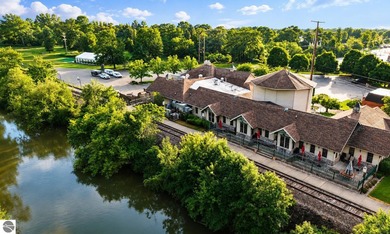 10,000sq. ft + acres in downtown Mt. Pleasant. 600' of River - photo 43