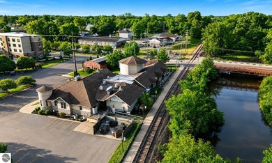 10,000sq. ft + acres in downtown Mt. Pleasant. 600' of River - photo 44
