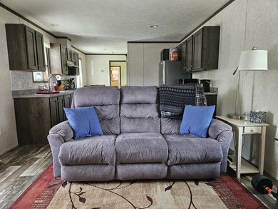 Tucked away at the end of the street in a mobile home park, this - photo 5