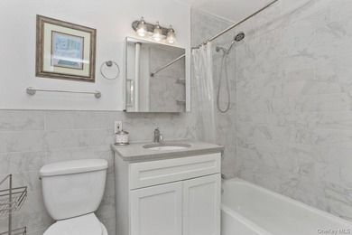 This freshly painted, supra sunny studio apartment in the quaint - photo 11