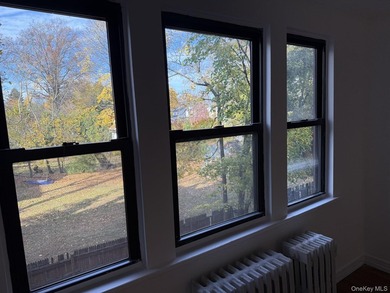 This freshly painted, supra sunny studio apartment in the quaint - photo 14