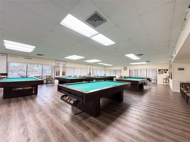 Immaculate and beautifully updated unit in a desirable 55+