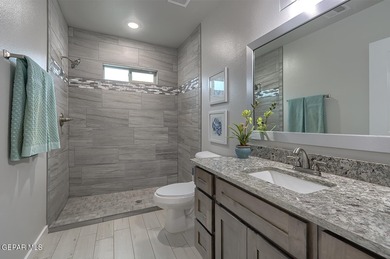 MODEL HOME. This single-story one-of-a-kind home offers so many