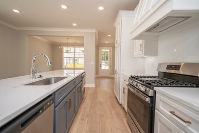 Popular Douglas A plan with 3 main level beds & 2 full baths! - photo 4