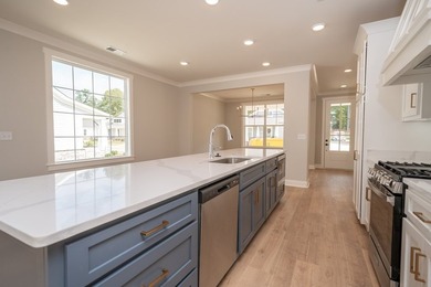 Popular Douglas A plan with 3 main level beds & 2 full baths! - photo 5