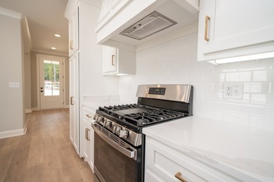 Popular Douglas A plan with 3 main level beds & 2 full baths! - photo 6