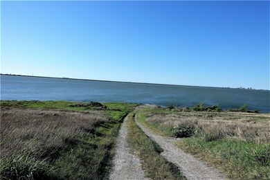 With 2,988.99' +/- of meandering Nueces Bay frontage along the - photo 13
