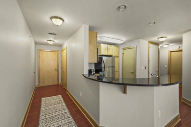 PRIME DOWNTOWN LOCATION WITH 2 ADJACENT PARKING SPACES!  Soak up