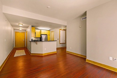 PRIME DOWNTOWN LOCATION WITH 2 ADJACENT PARKING SPACES!  Soak up