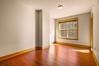 PRIME DOWNTOWN LOCATION WITH 2 ADJACENT PARKING SPACES!  Soak up