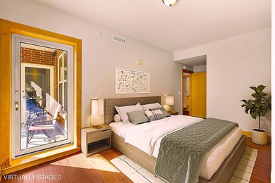 PRIME DOWNTOWN LOCATION WITH 2 ADJACENT PARKING SPACES!  Soak up