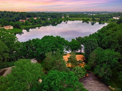 Nestled at the end of a private drive, this lakeside sanctuary - photo 2