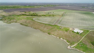 With 2,988.99' +/- of meandering Nueces Bay frontage along the - photo 24