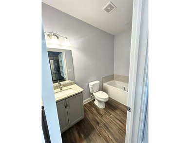 NEW AND IMPROVED!! THIS HOMES BRIGHT AND AIRY FEEL IS SURE TO - photo 31