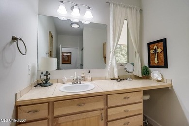 Nestled in a highly desirable golf cart community, this spacious - photo 13