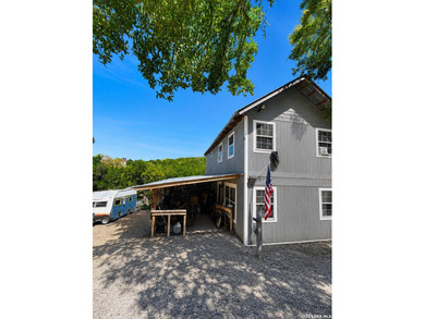 3-bedroom, 2-bath home on 1.2 private acres in Lake Hills with - photo 1