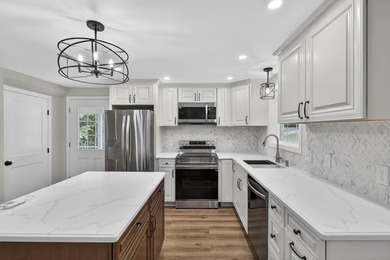 Welcome to 528 Sebago Road, a beautifully renovated 3 bedroom, 2 - photo 4