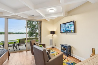 Experience luxury lakeside living on Lake Delton in this - photo 12