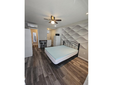 This charming studio condo offers an ideal blend of - photo 14