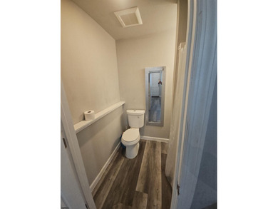 This charming studio condo offers an ideal blend of - photo 17
