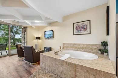 Experience luxury lakeside living on Lake Delton in this - photo 24