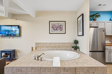 Experience luxury lakeside living on Lake Delton in this - photo 25